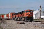 BNSF 7581 leads a eb stack train at la plata mo.